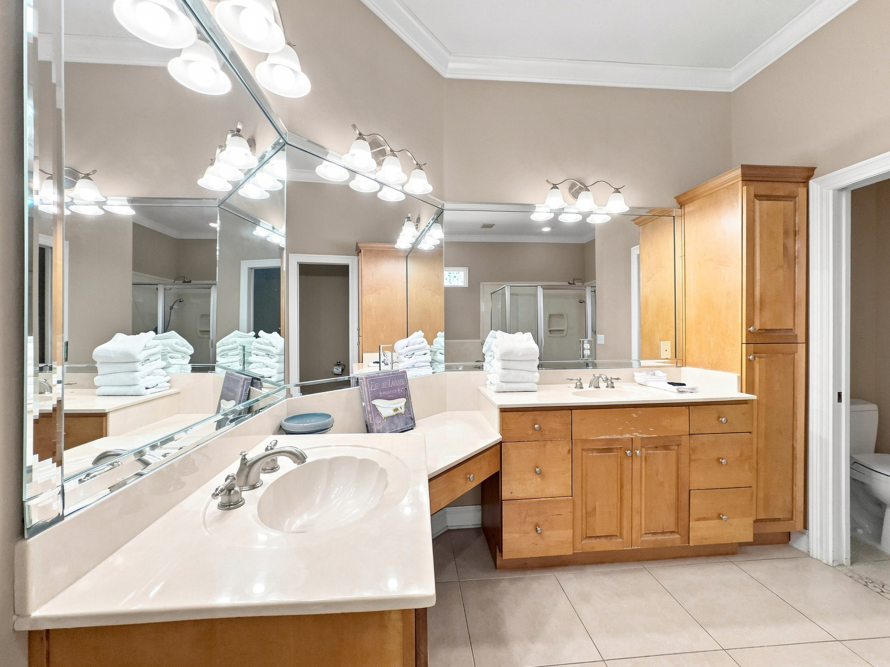 Bathroom with a dual-sink vanity and generous storage