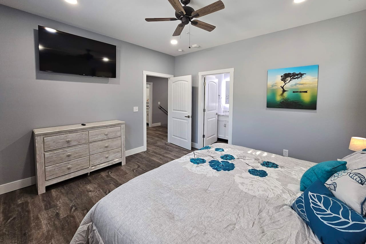 Spacious king suite with smart TV and private bath.