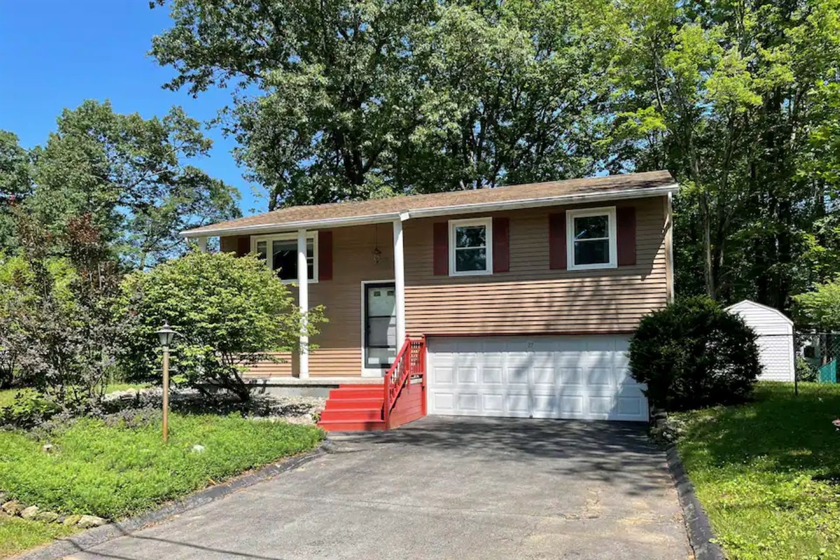 View of the home's front, garage not available to park.