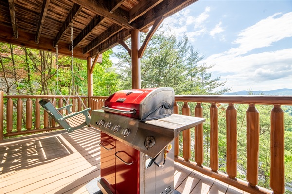 Fair warning — whoever claims the porch swing first isn't giving it up. Mountain views, tree canopy, and a breeze that makes you forget what day it is.