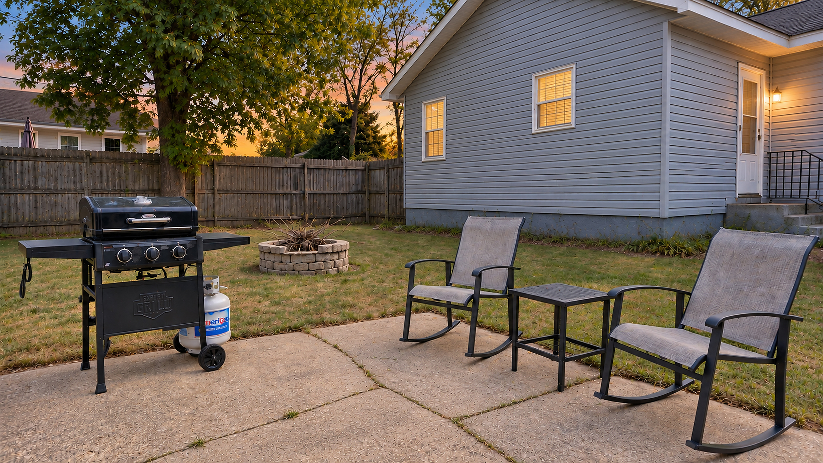 Relax outdoors with a gas grill, fire pit and comfortable rocking chairs.