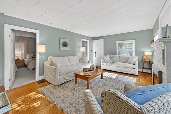 Our living room is the heart of the cottage, where laughter echoes and cozy moments unfold.