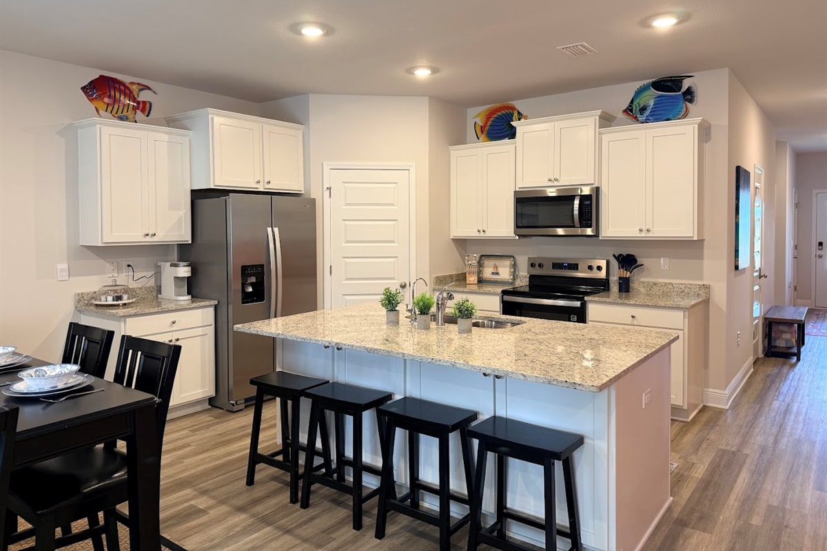 Well‑stocked kitchen with cookware, coffee essentials, and plenty of prep space.