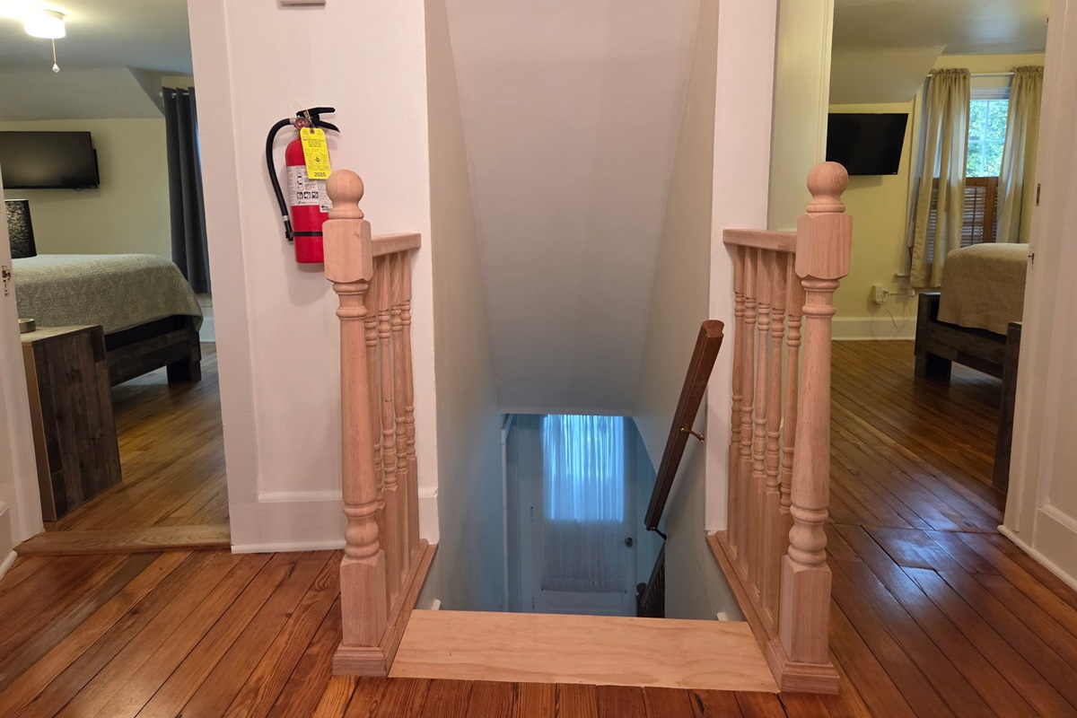 Stairwell to down to the 1st floor.