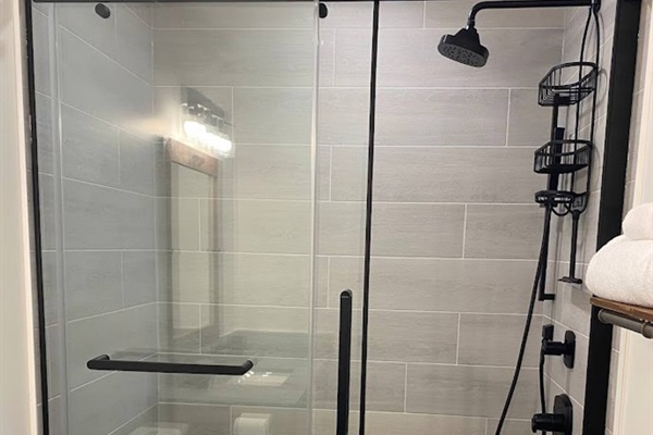 Attractive, well-appointed lower floor bathroom with roomy shower