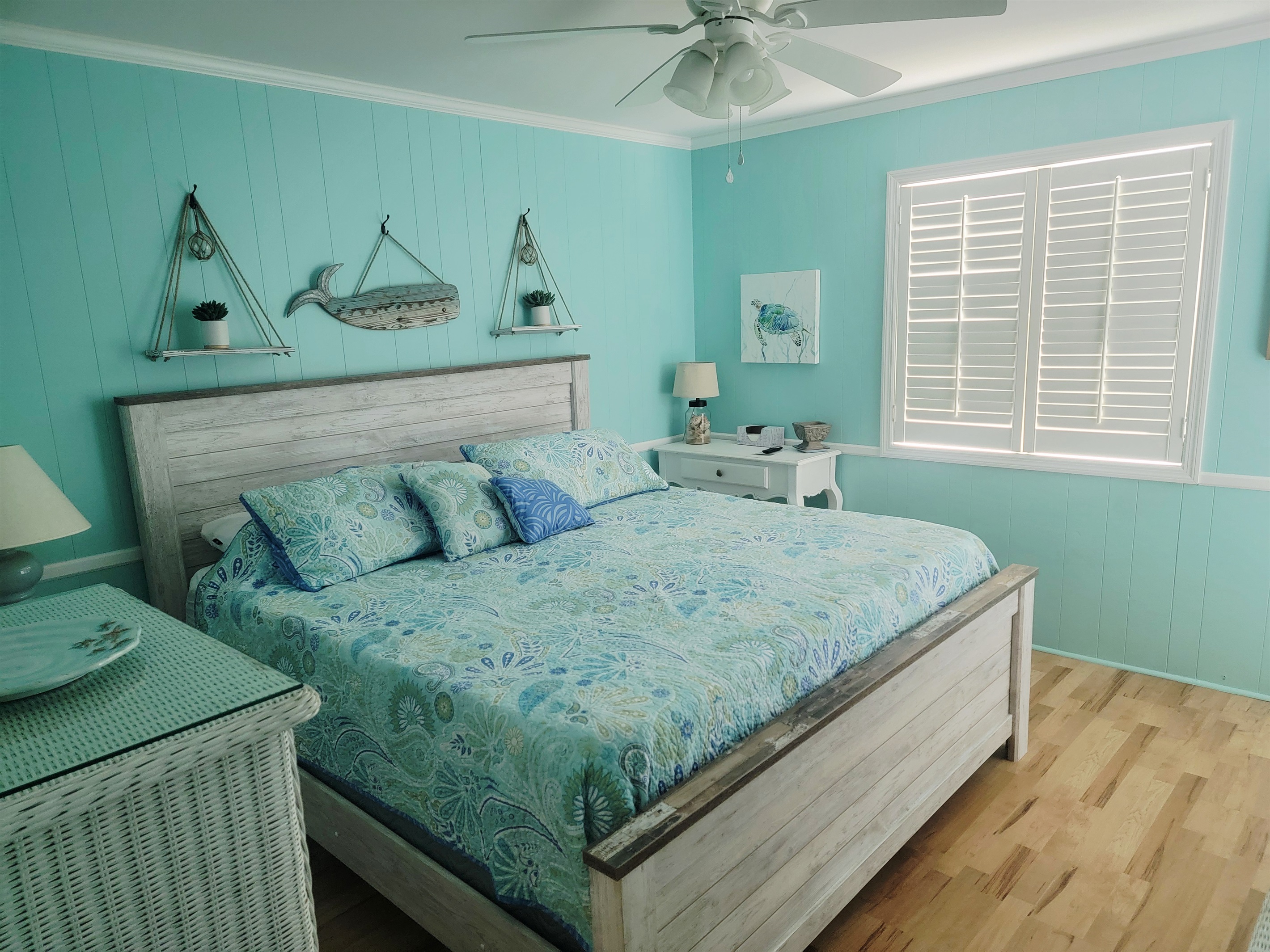 Primary Suite with King size bed, deck access and attached primary bath