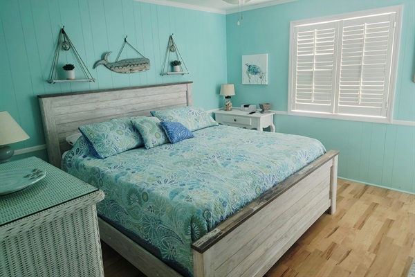 Primary Suite with King size bed, deck access and attached primary bath