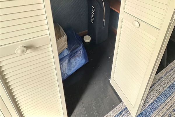 pack n play in upper back bedroom closet