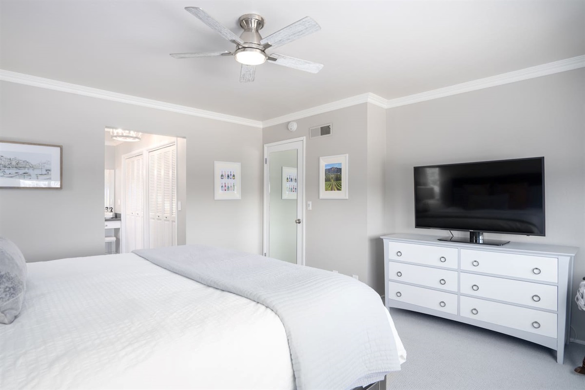 Unwind in style with your own private TV in our primary bedroom.