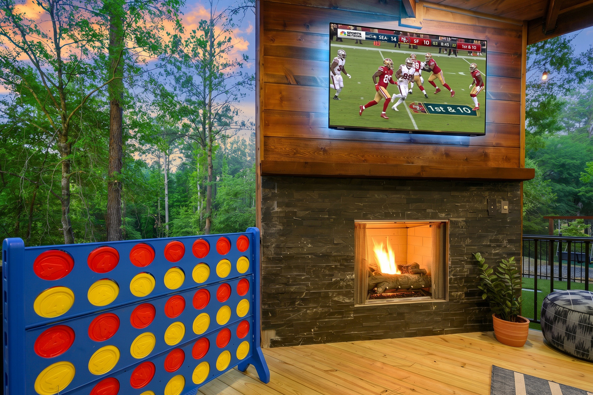 The covered deck is made for staying awhile. Catch the game by the fireplace while the kids play nearby, challenge someone to Connect 4 & enjoy the pines without leaving the action.