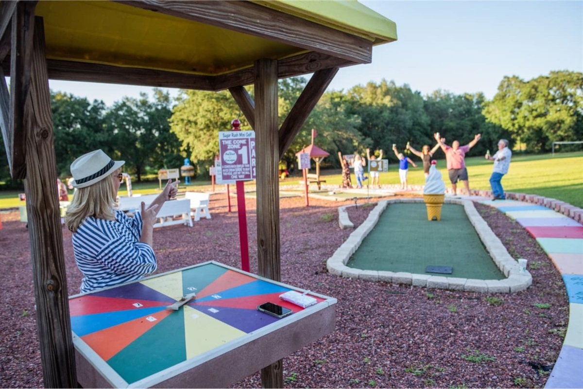 A custom-built "Candyland" game wraps around the entire mini golf course!