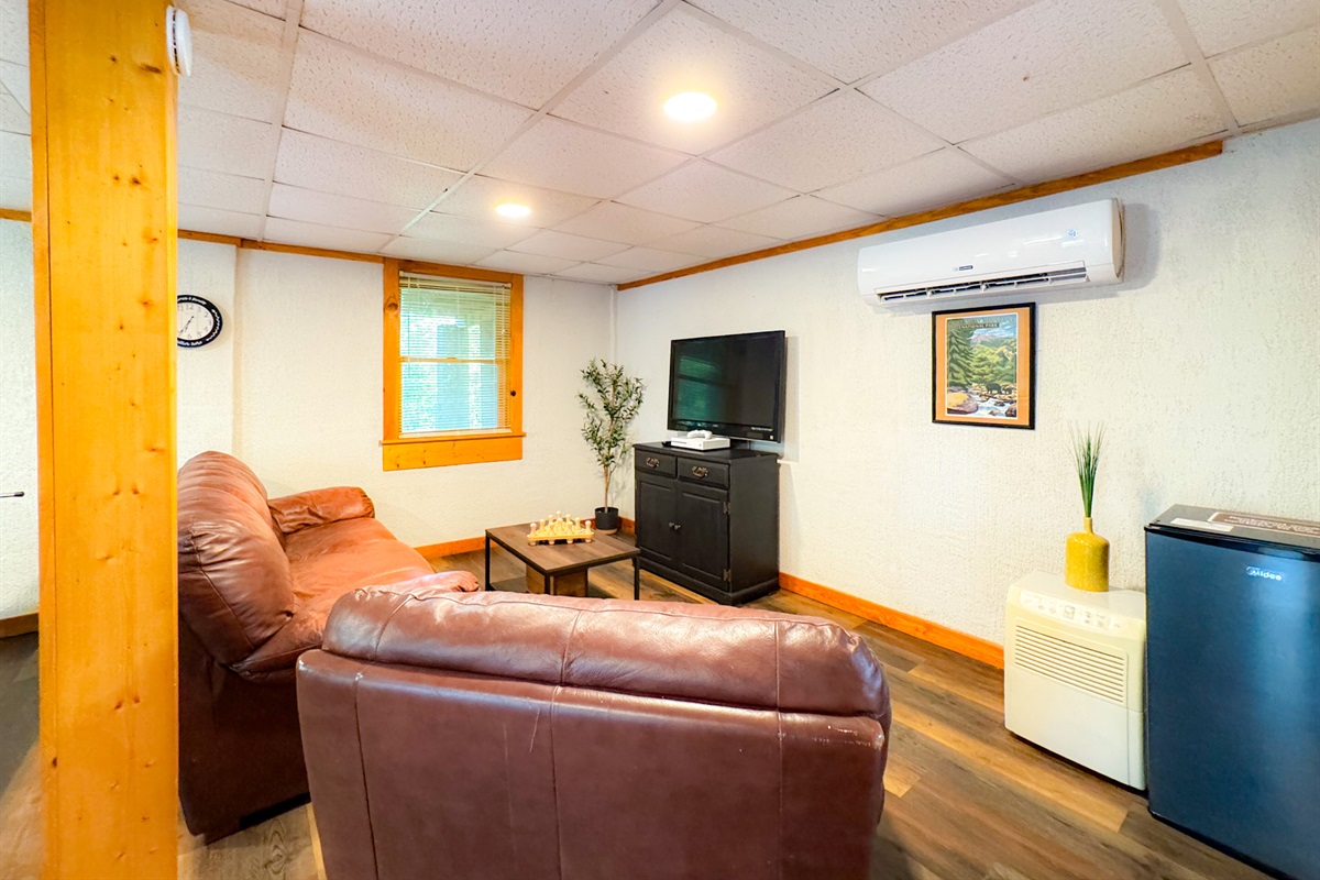 sitting area in the lower level game room