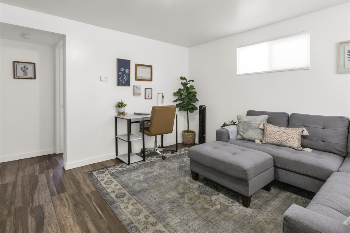 Cozy living room with workspace