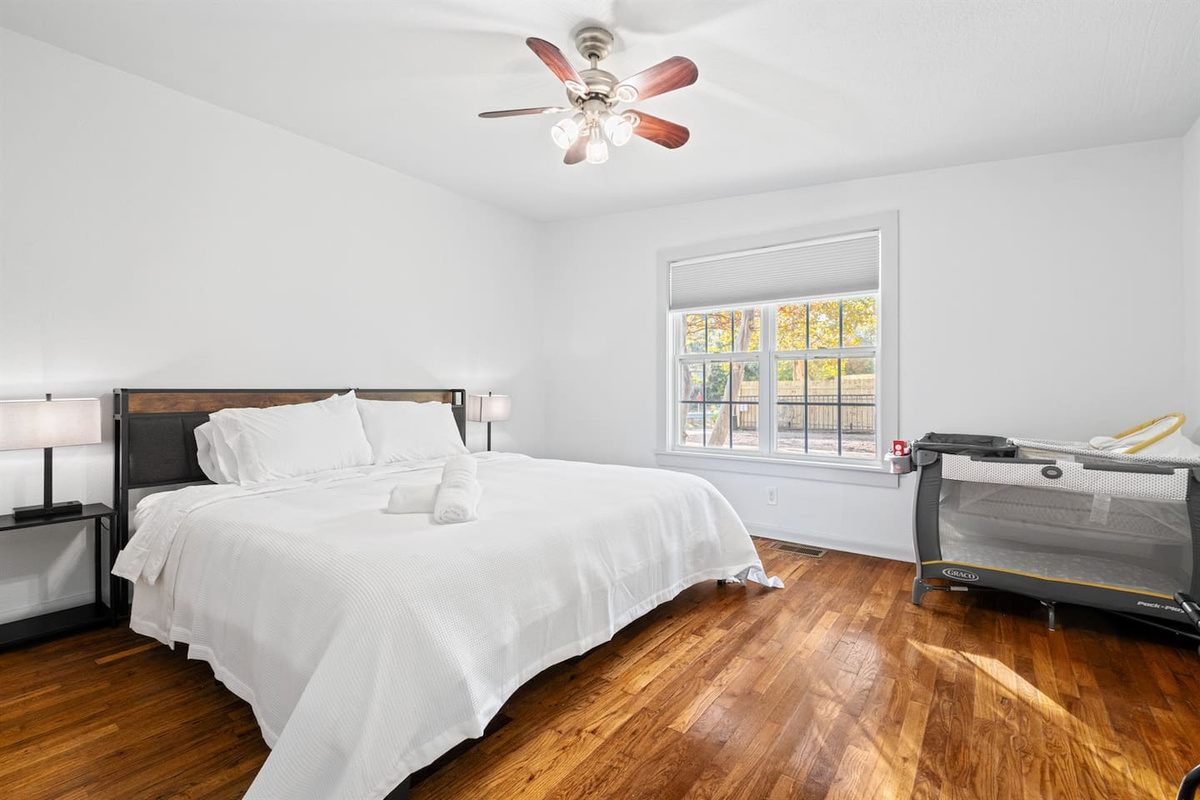 Front Home: Spacious Front Bedroom with Scenic Window View