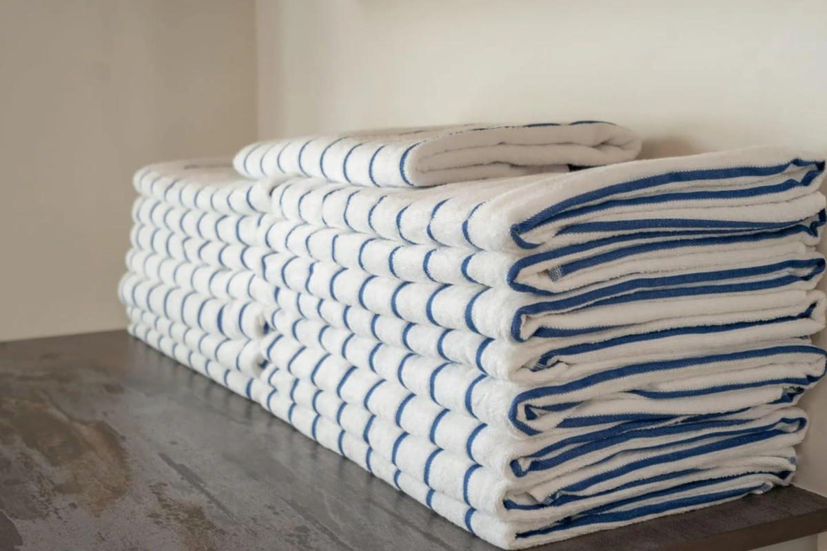 Fresh, neatly stacked towels are ready and waiting for every guest.