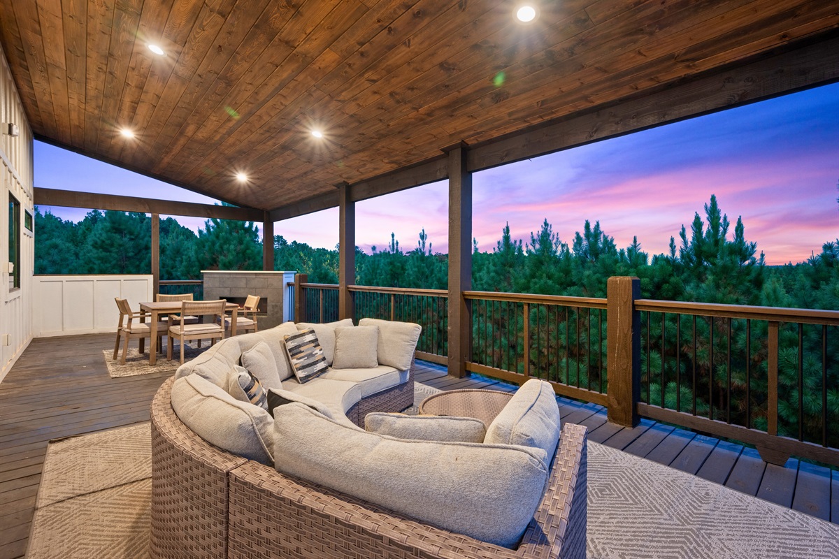 Spacious deck with sectional seating for the whole group.