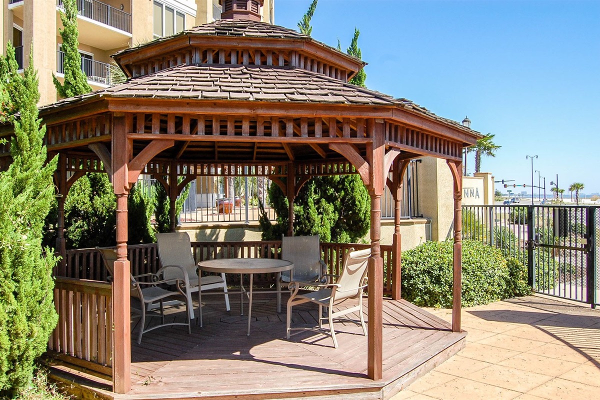 Gated rear courtyard/pool area with gazebo