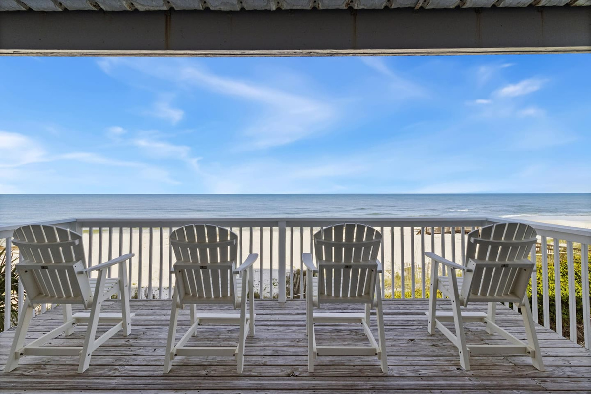 Settle into the beachside seating with a morning coffee &mdash; the Gulf is right there and nowhere else you need to be.
