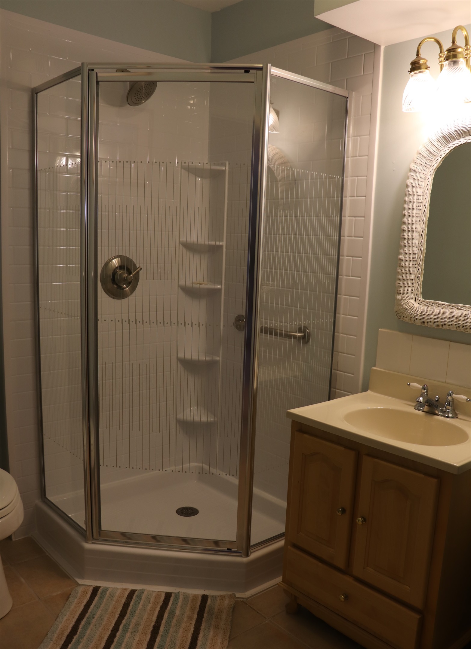 Bathroom w/ shower.