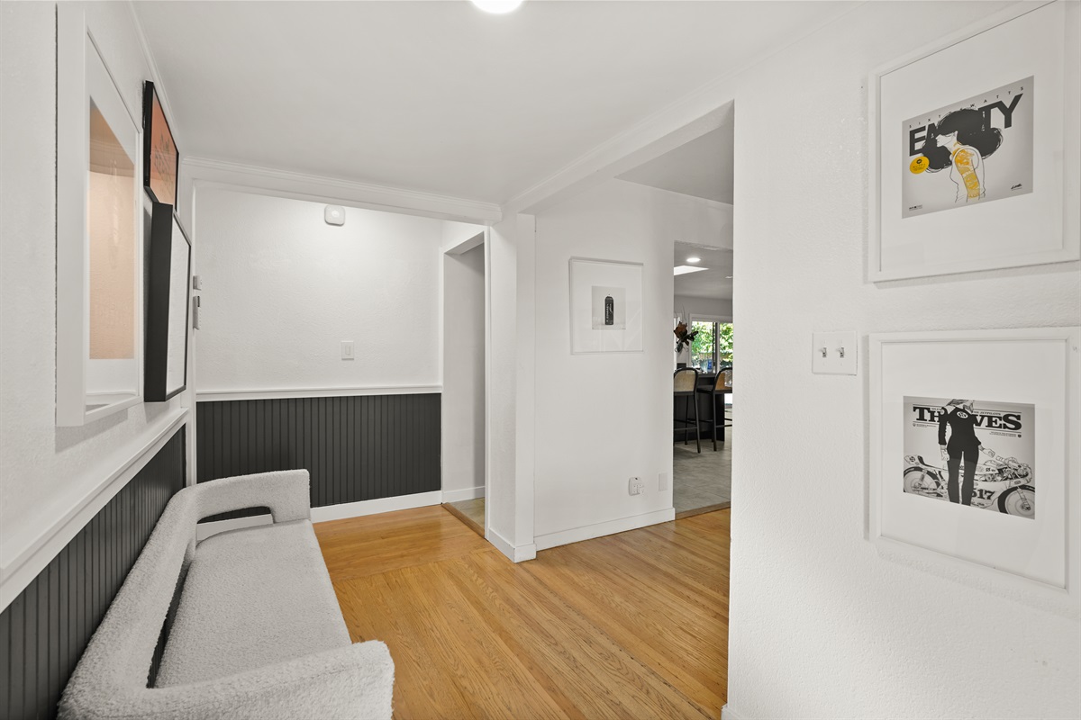 Step into a warm and welcoming entryway that sets the tone for your Napa getaway, with stylish décor and easy access to the home's main living spaces.