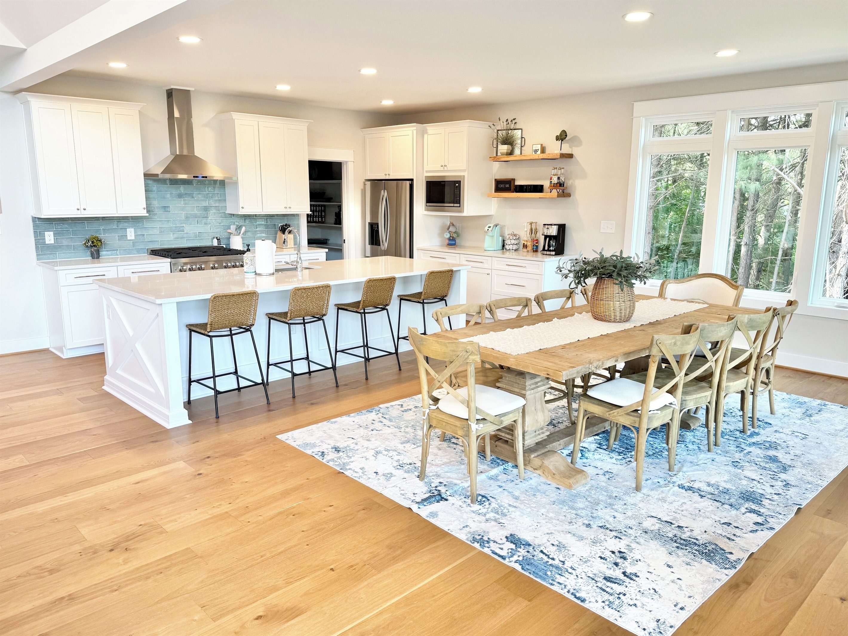 Our teal backsplash is a showstopper and the showpiece of the kitchen. Fun Fact:We loved this teal backsplash so much in the design showroom that it has set the tone for the entire color pallet inspiring the colors that flow throughout Blueberry Bay!