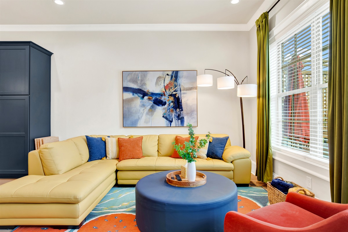 Living room with walk out to raised patio on 2nd floor