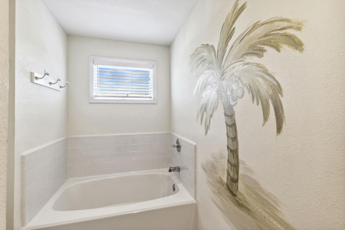 Step into the master bath shower and rinse off the salt air after a long Gulf coast beach day.