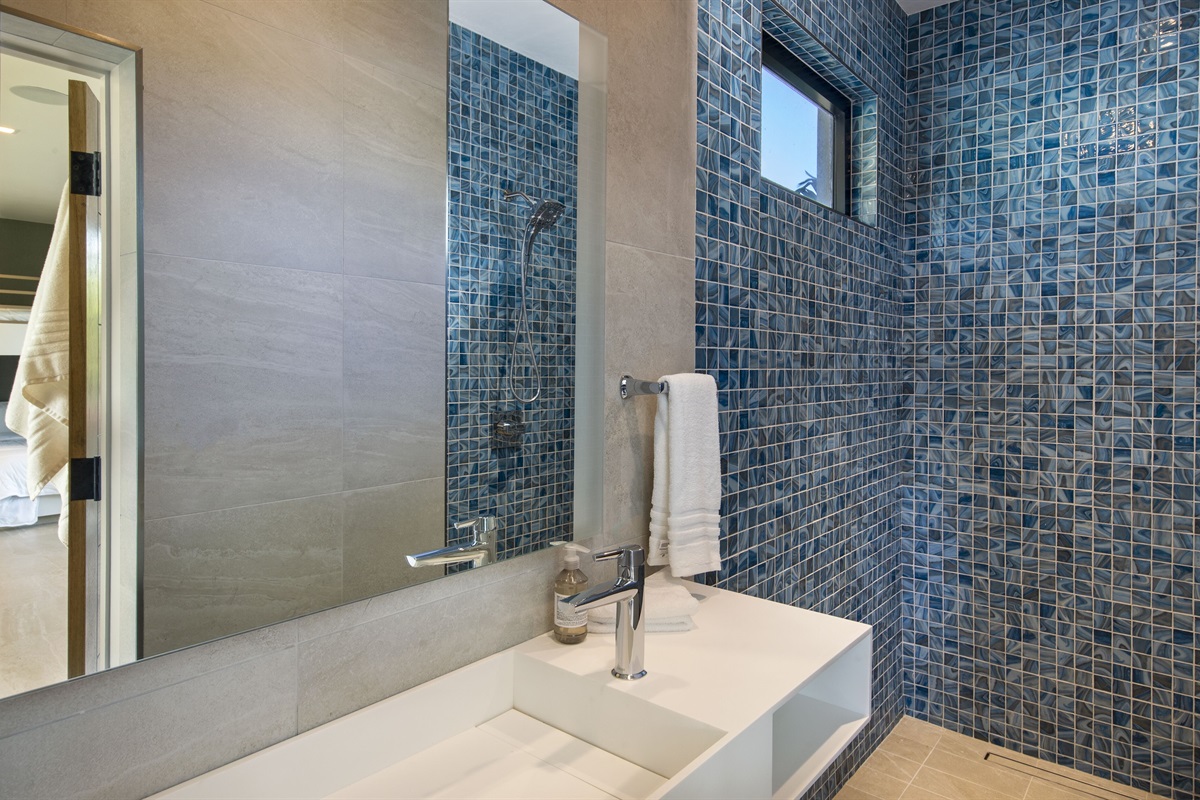 Bunk room's bathroom with large shower