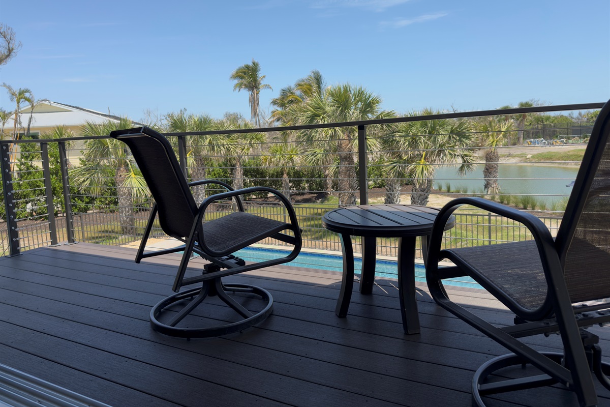 Porch overlooking the pool