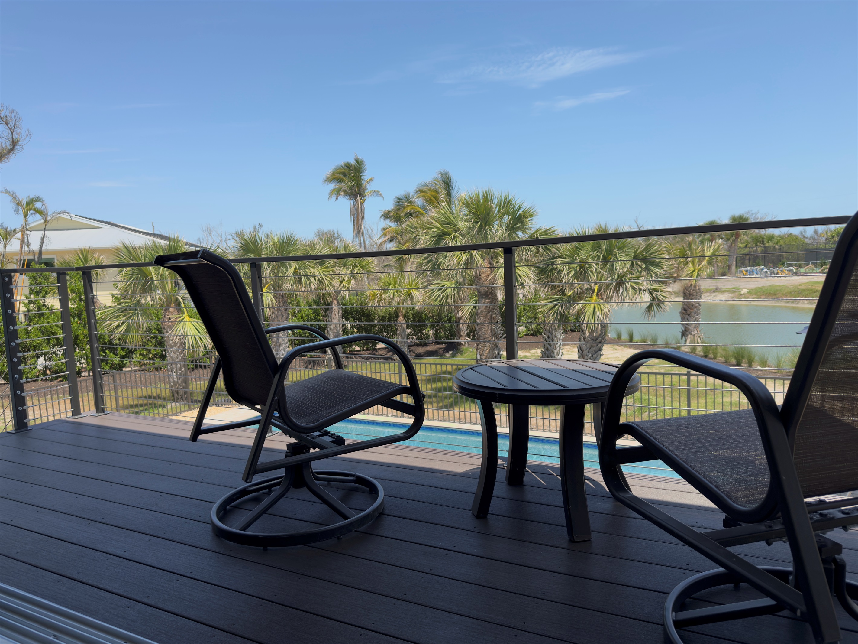 Porch overlooking the pool