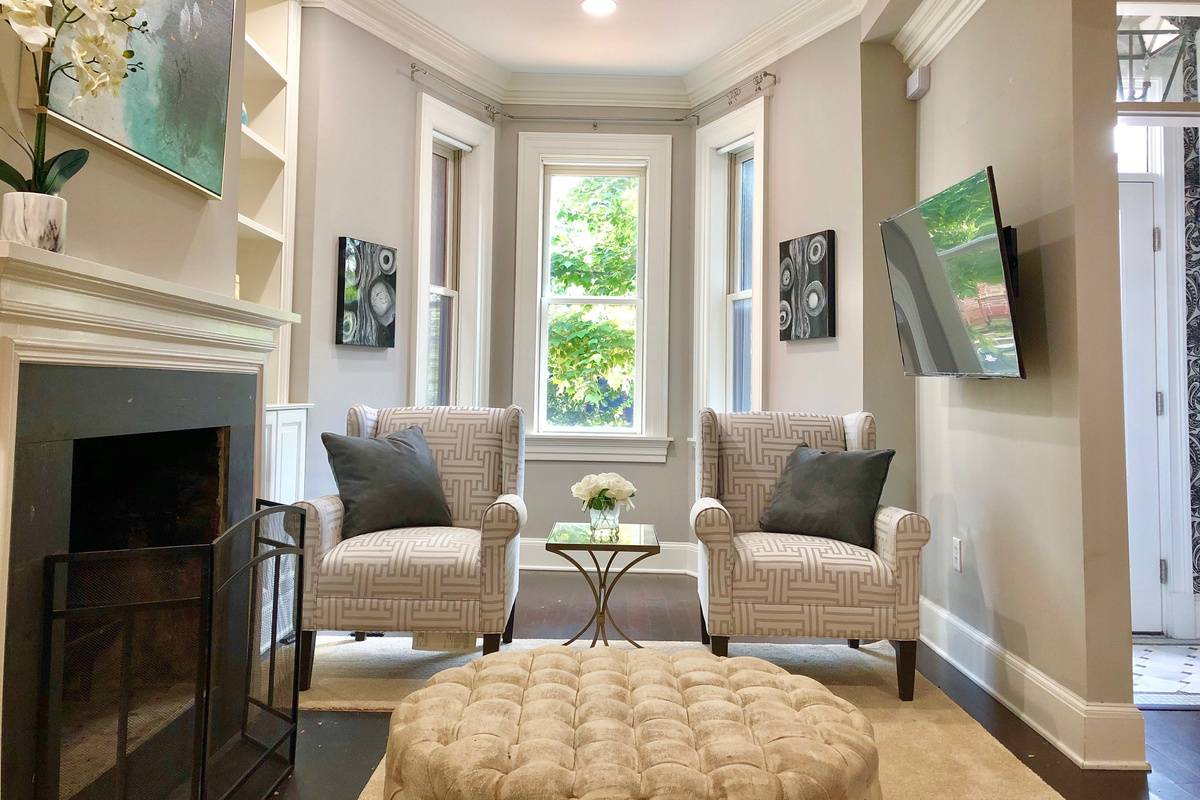 Unwind in style with plush seating, a tufted ottoman, and a 55" 4K Roku TV offering 100+ streaming channels for your entertainment.