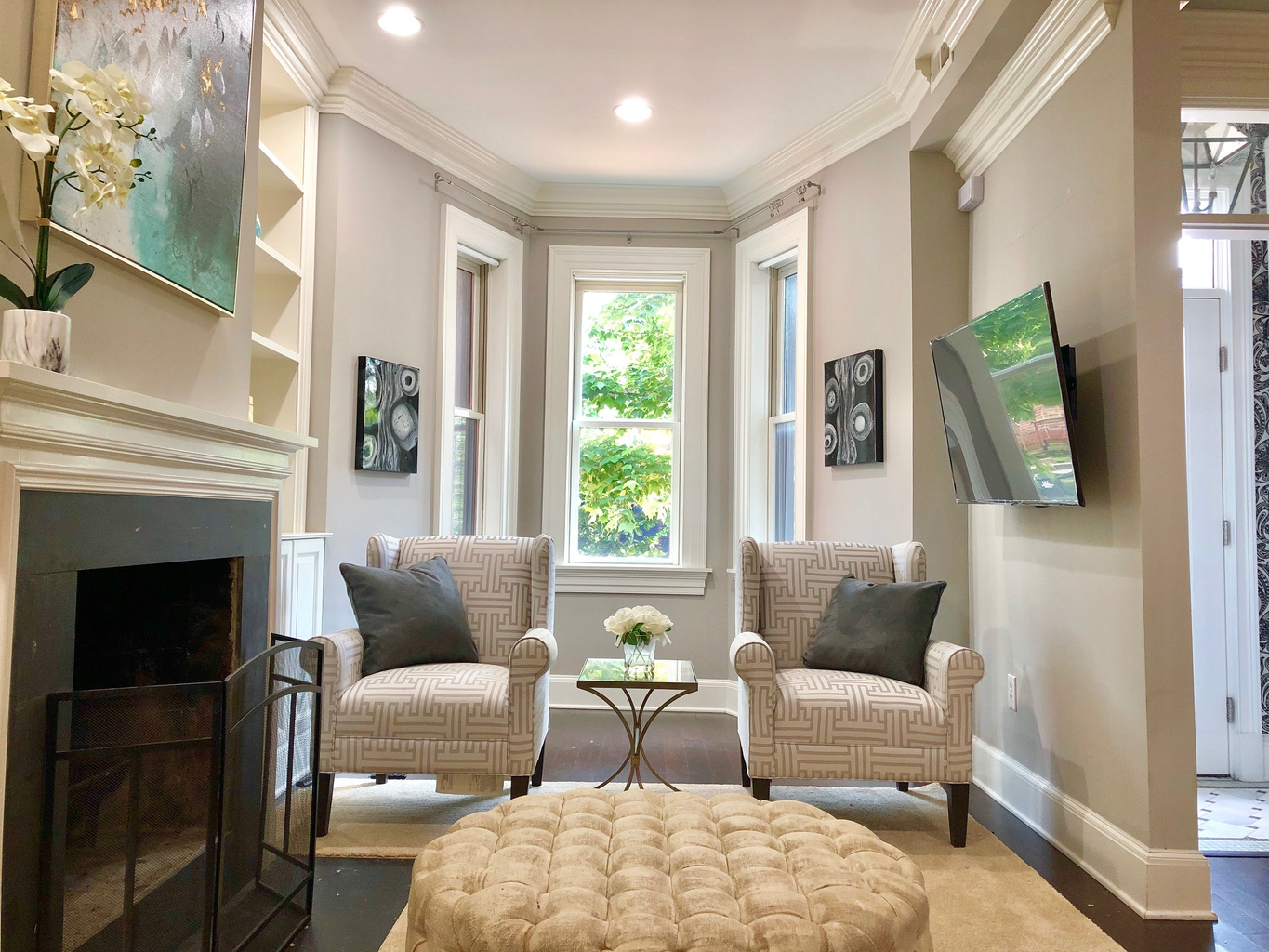 Unwind in style with plush seating, a tufted ottoman, and a 55" 4K Roku TV offering 100+ streaming channels for your entertainment.