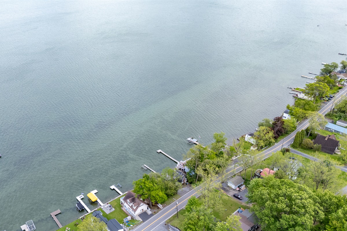 Nestled along a scenic shoreline, this cozy lakefront retreat sits in a charming and peaceful neighborhood 🌳🏘️✨