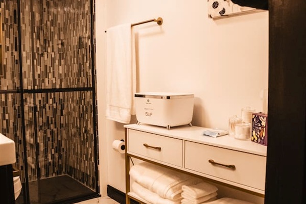 Wrap yourself in a toasty towel from the towel warmer after your spa shower. Plenty of extra towels.