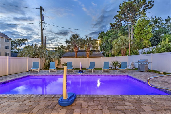 Enter a realm of enchantment as our swimming pool transforms under the night sky. Illuminated by gentle lights, its waters shimmer with quiet elegance, inviting you to unwind in the tranquil embrace of evening. Welcome to your oasis