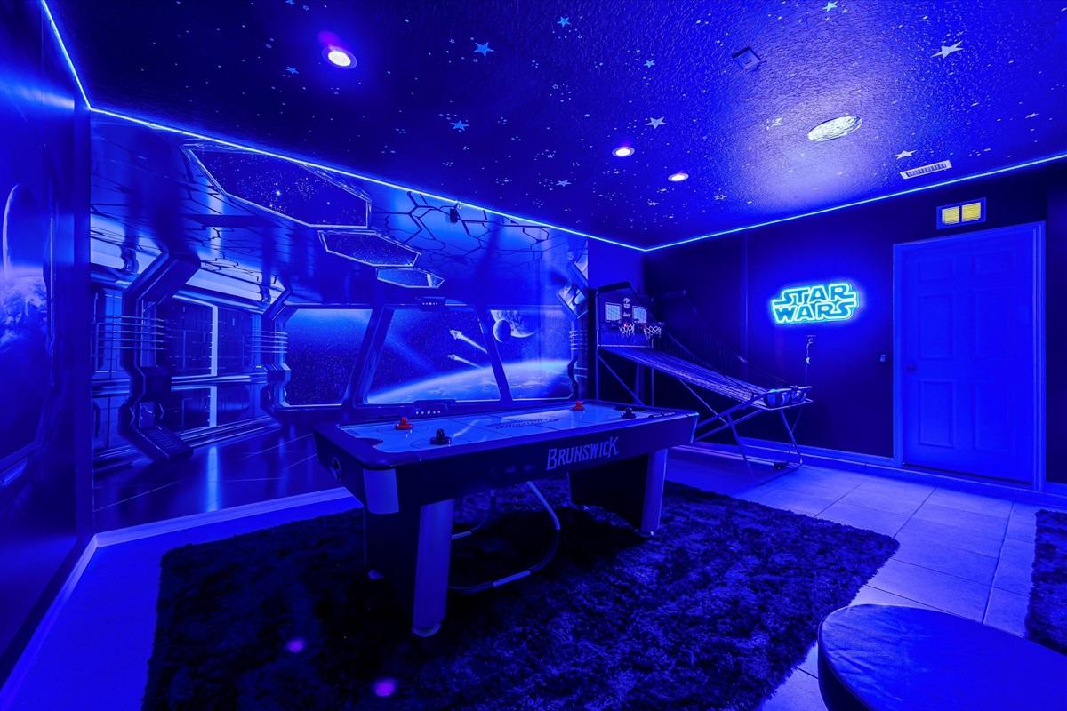 Air hockey, arcade machines, and basketball game — fun for the entire family.