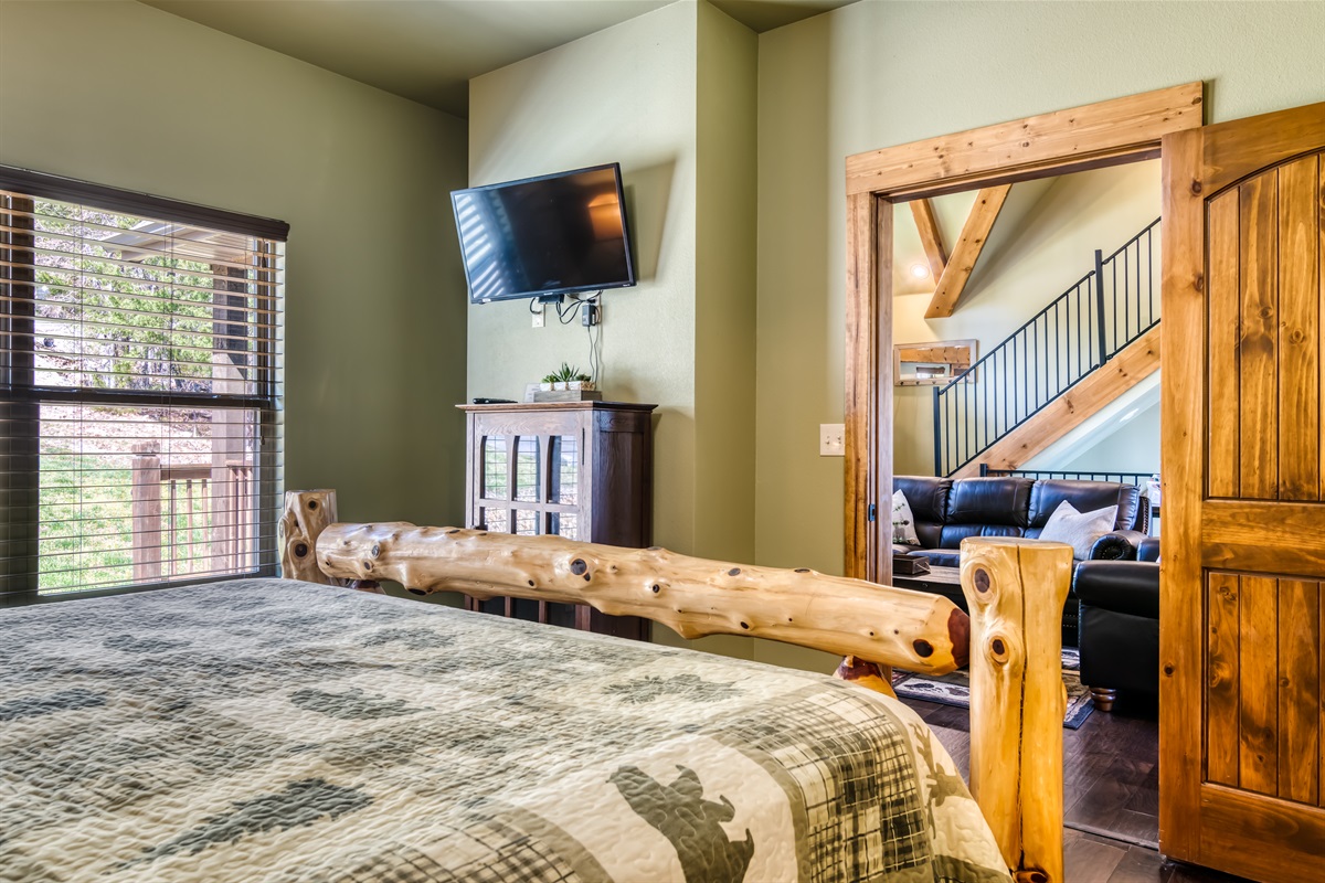 Main floor King bedroom located just off of the living space