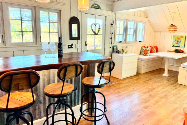 Totally custom designed from tip to tail... like this reclaimed Santa Barbara mountain living edge bar top with recessed lighting. 