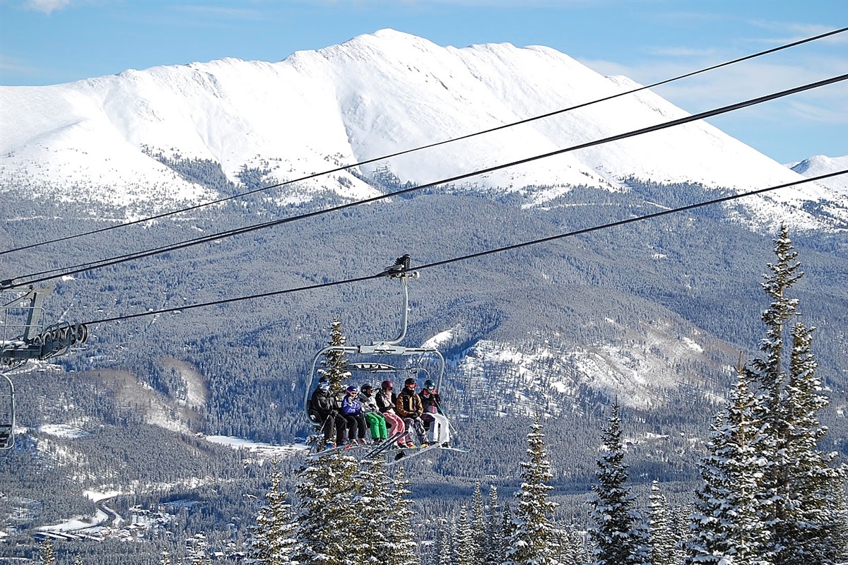 Skiers on chairlift at Breckenridge Ski Resort