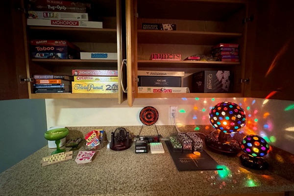 Game cabinet with guidebooks and lots of fun for everyone