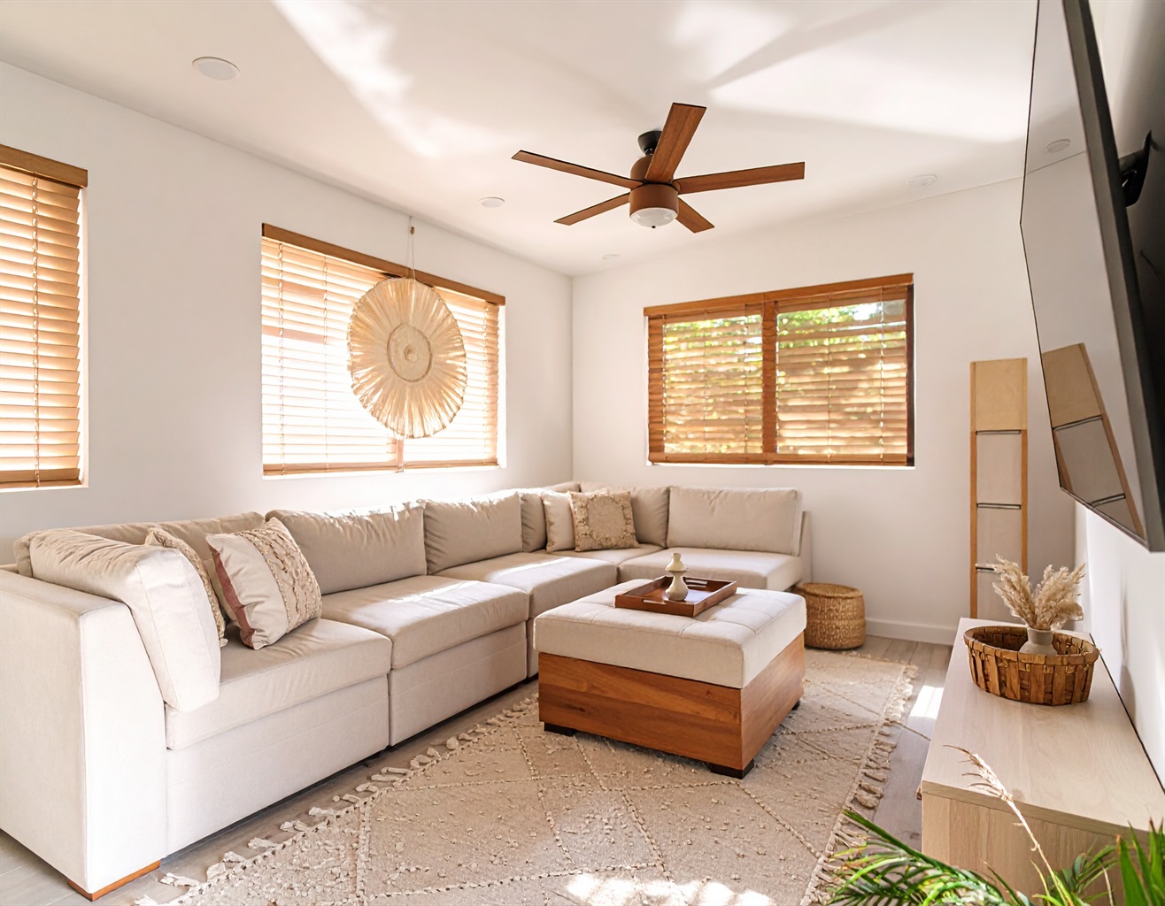 living room with large flatscreen tv | Representative Interior. Décor / Finishes May Vary.