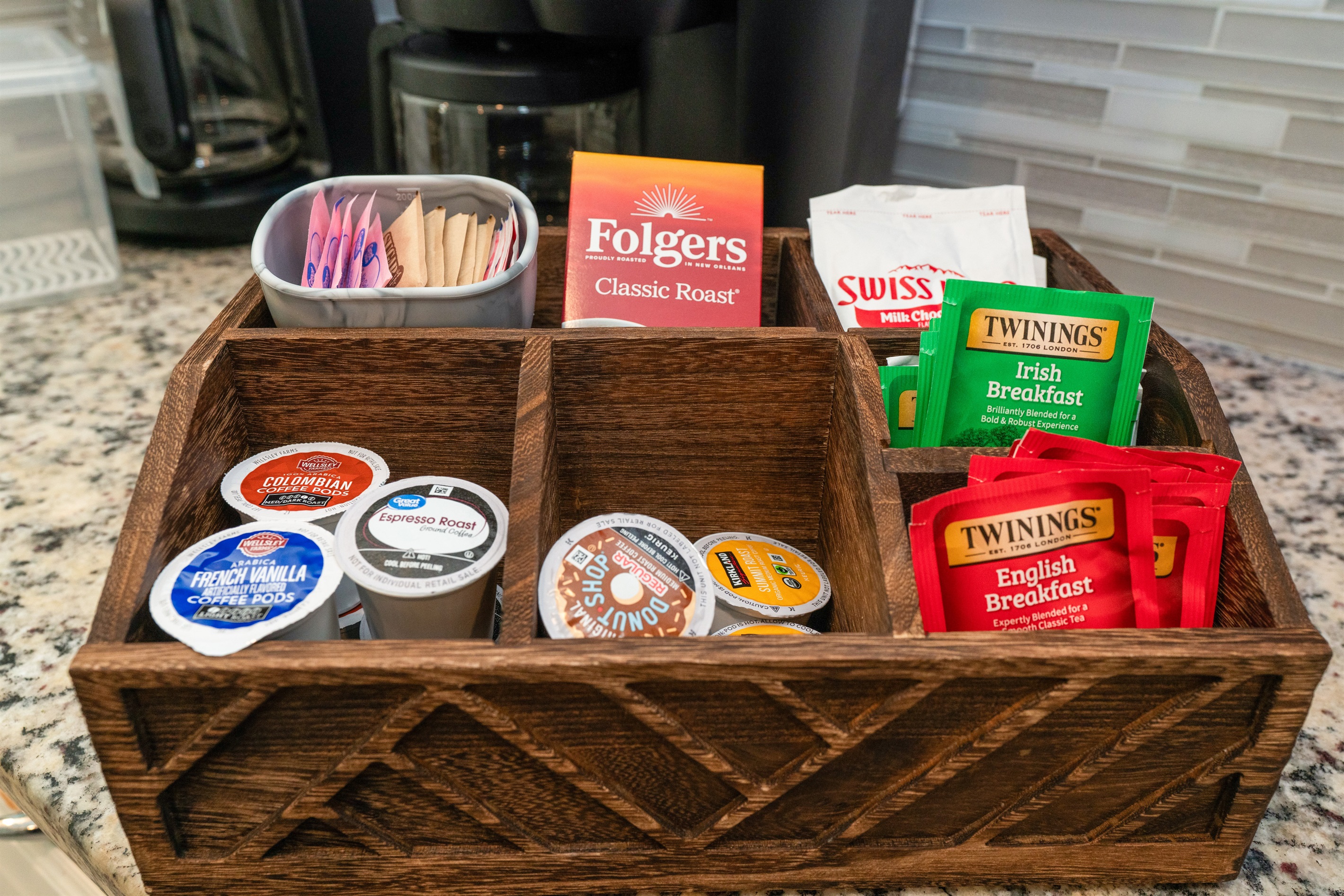 Start your day at the coffee station with a Keurig, coffee pods, English & Irish teas, hot chocolate, and a sugar box — everything for a comforting brew anytime.