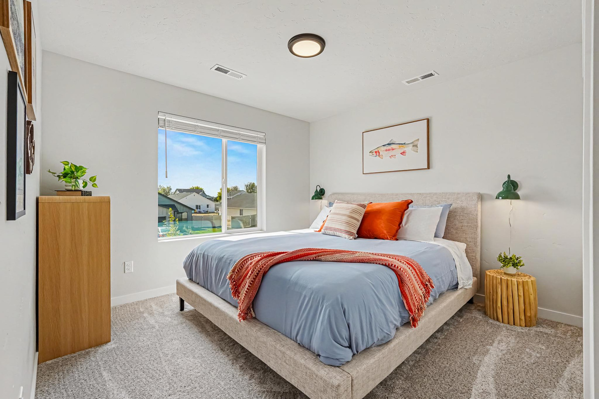 The second upstairs bedroom also features a comfortable California king-size bed.