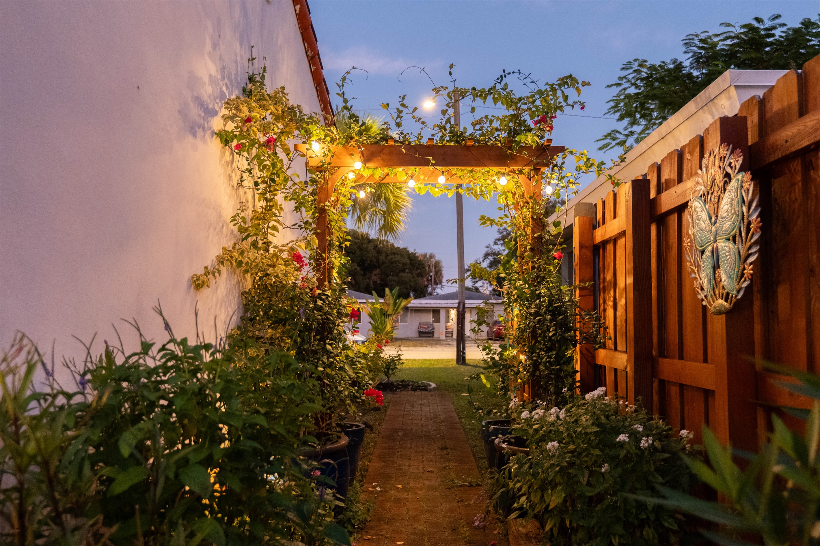 Garden walkway with flower covered arch