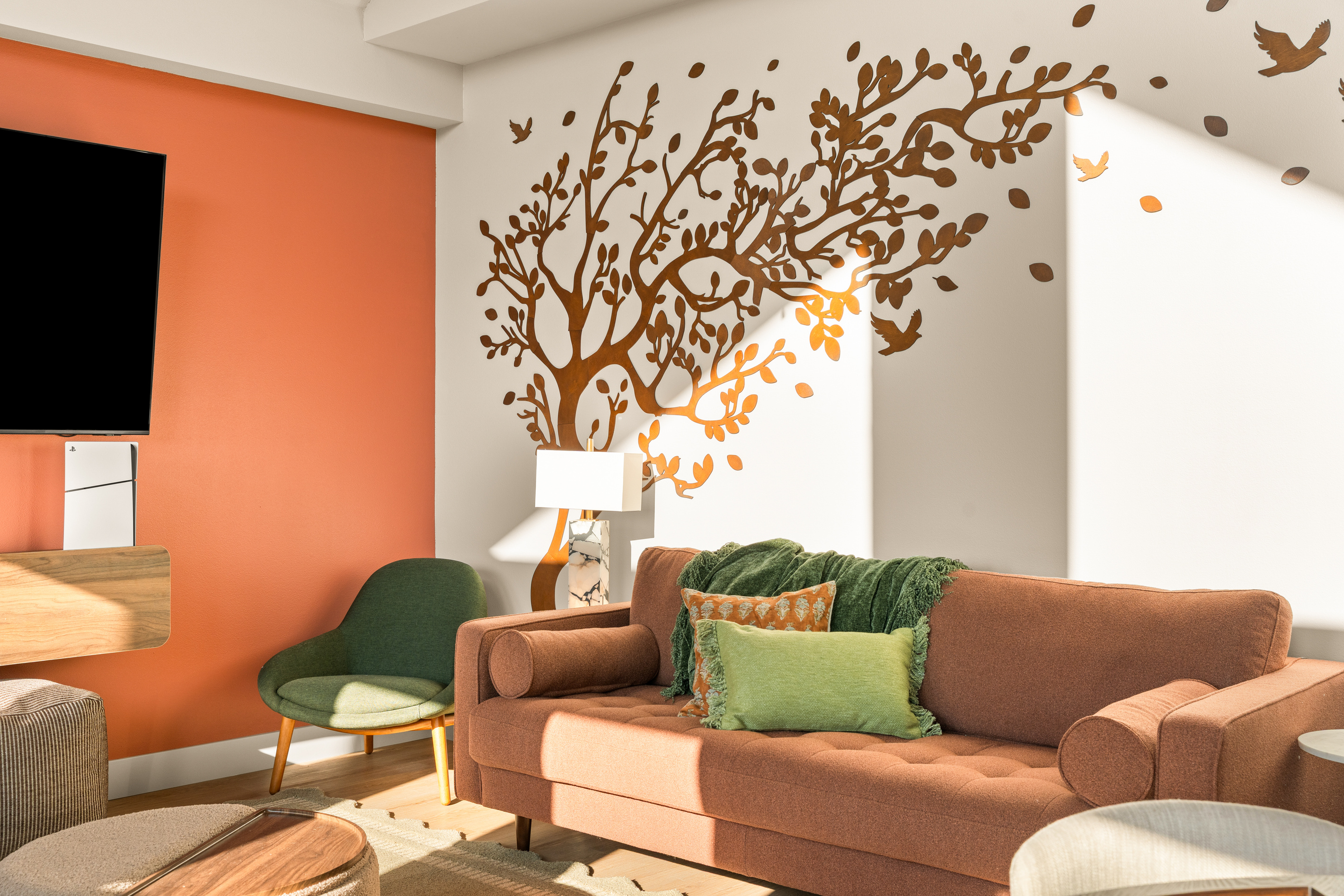 Bright, playful color and comfortable seating give this second gathering space a fun personality all its own.