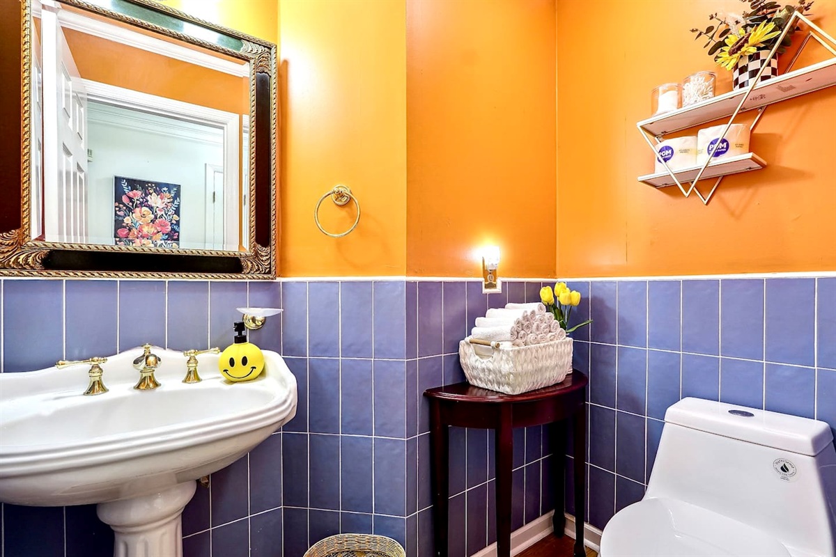 Main level half bathroom. 