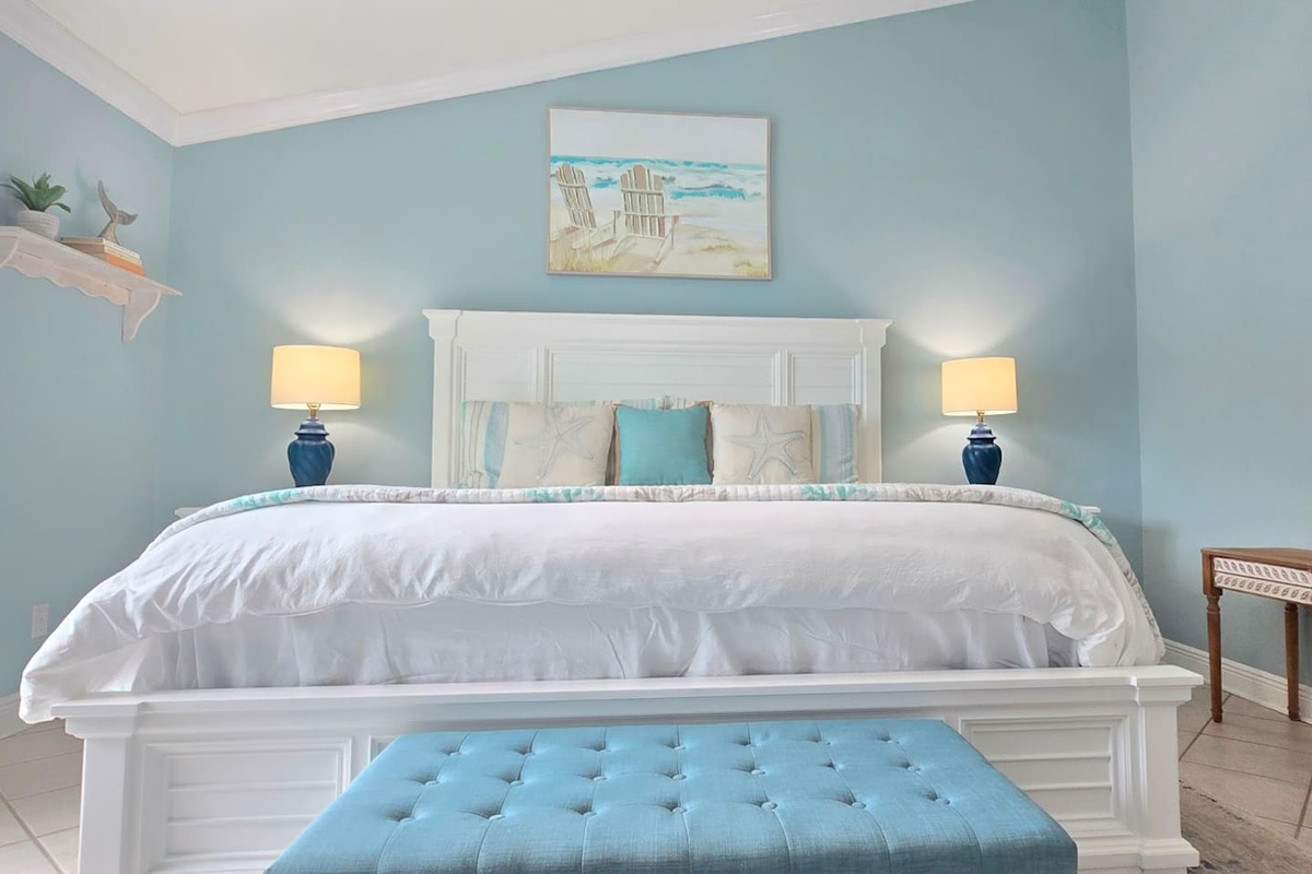 Wake up in the king master suite and realize the Gulf is still right outside &mdash; this is the room that makes the whole trip worth it.