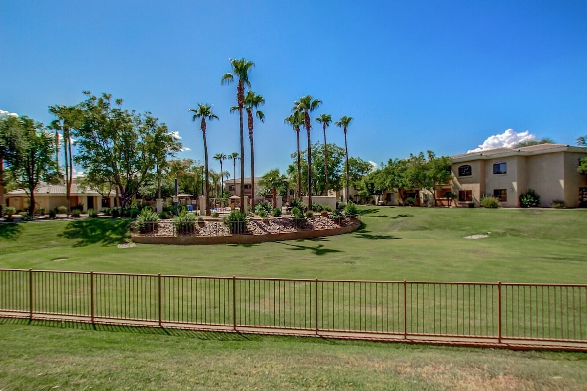 Lots of green grass on the grounds.