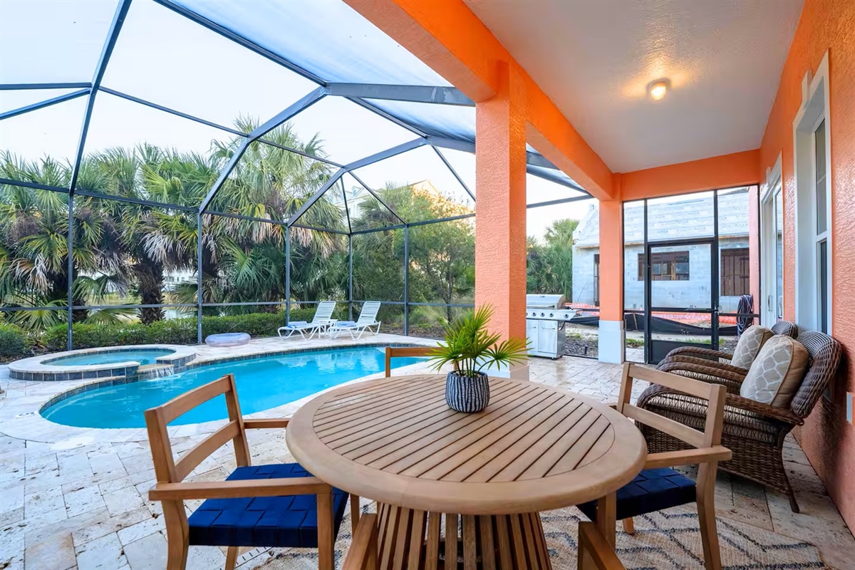 Outdoor dining with your private pool view 🌴
Enjoy meals under the covered patio, take a dip in the screened pool and spa, or fire up the grill—perfect for laid-back coastal living.
