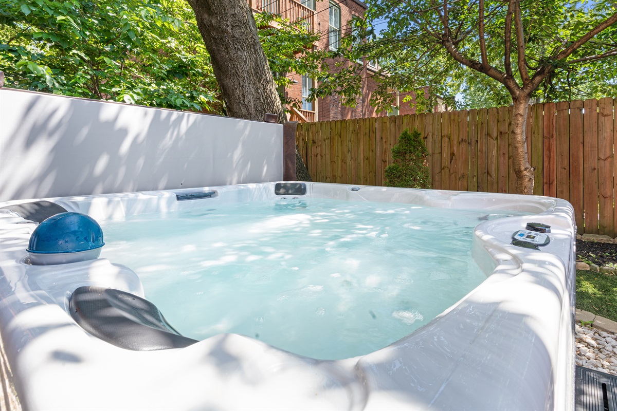 Relax in the private hot tub after a day in the city.